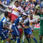 Red Bulls striker Fabian Espindola elevates over several players during second half action.